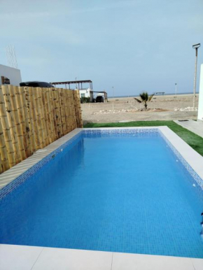 Casa de playa frente al mar
